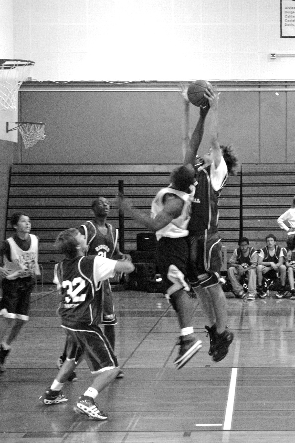 Revere's Dusty Reynolds (right) grabs a rebound in the finals against Marina Middle School. Photo: Tim Reynolds